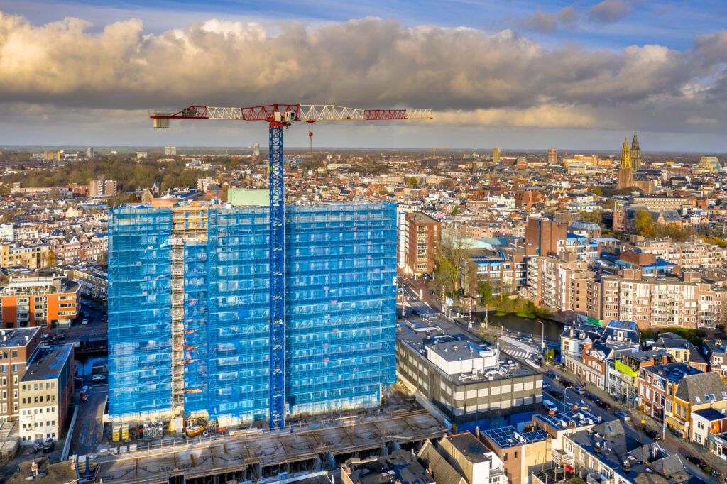 Aerial view of construction crane building high rise apartment building in the city of Groningen, the Netherlands