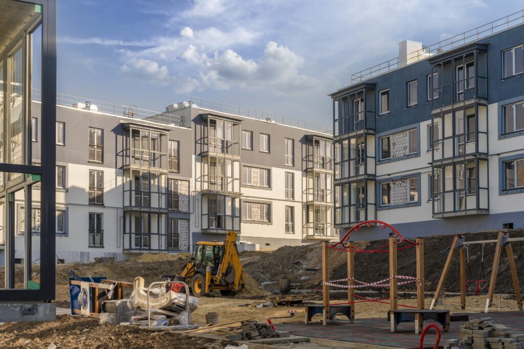 a costruction site of building apartments, industry work business costruction site of building apartments, industry work business